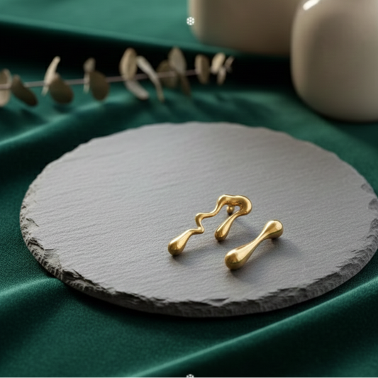Mixed-metal fashion earrings by Aurakaai